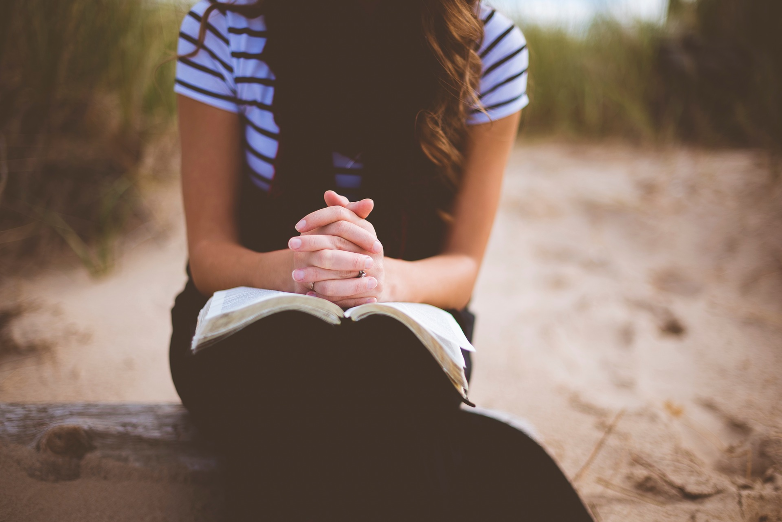 girl reading a Bible